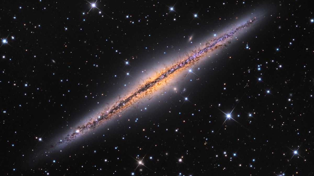 A spiral galaxy viewed from the side.